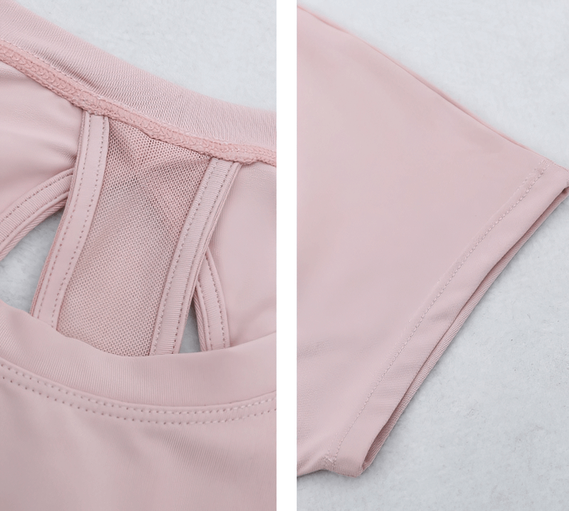 Close-up of Short Sleeves Mesh Loose Yoga T-Shirt with beautiful mesh back and soft pink fabric, ideal for comfort and flexibility.